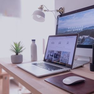 Laptop and desktop on a table